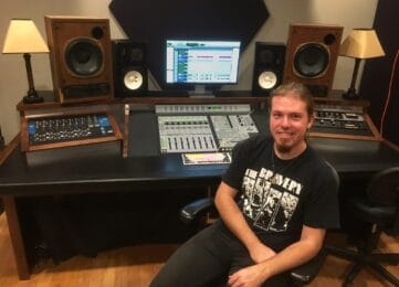 James Cross sitting at a mixing desk